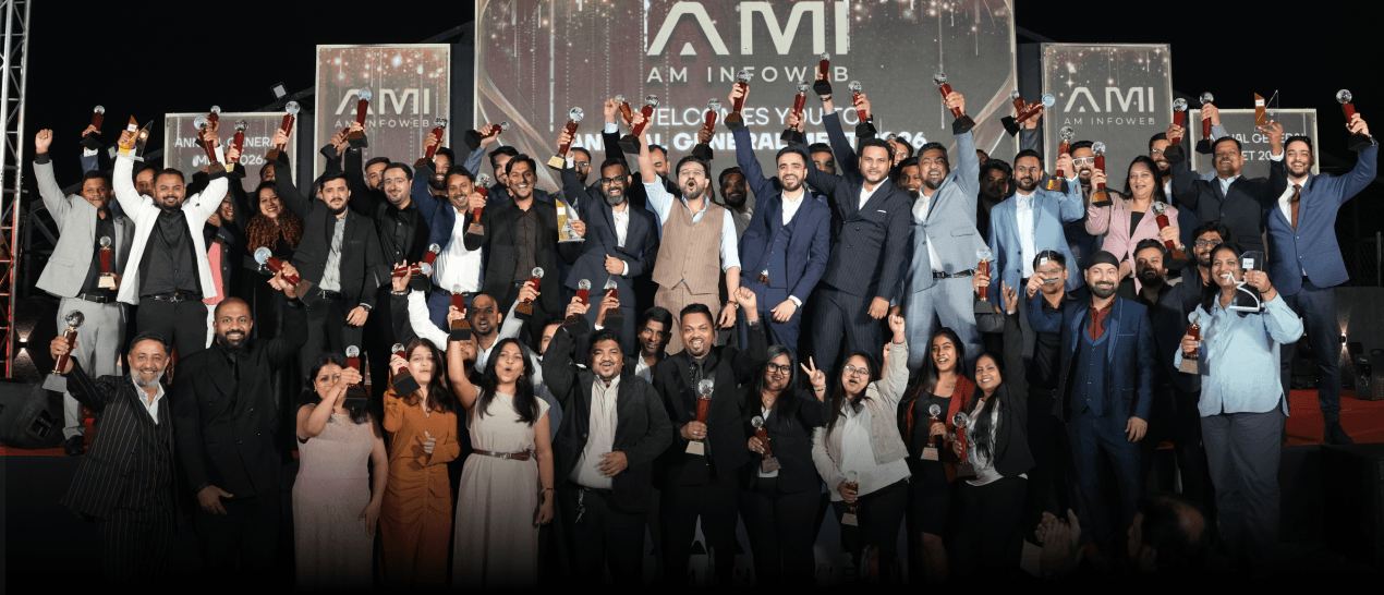 AM Infoweb Rewards and Recognition gala night showing employees celebrating with awards at the annual general meet.