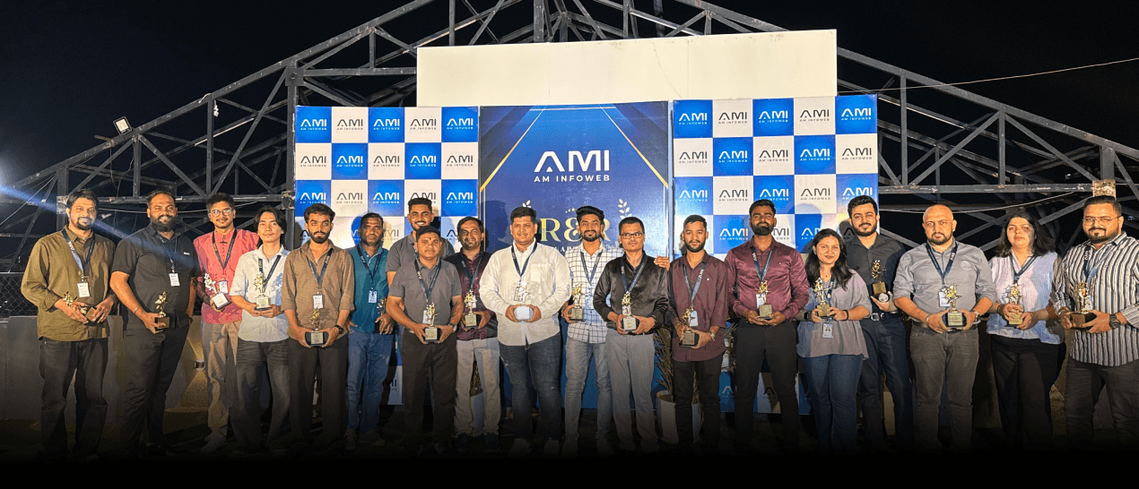 AM Infoweb Rewards and Recognition event showing employees receiving trophies for their achievements.