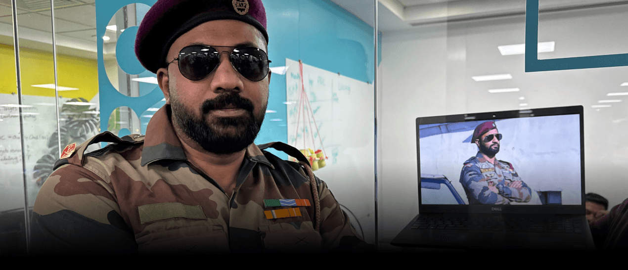 AM Infoweb Bollywood Day showing employees dressed as film-inspired characters during a themed office event.